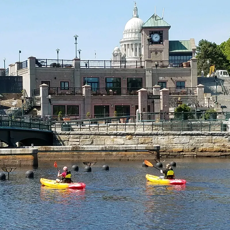 a yellow boat sitting on top of a building